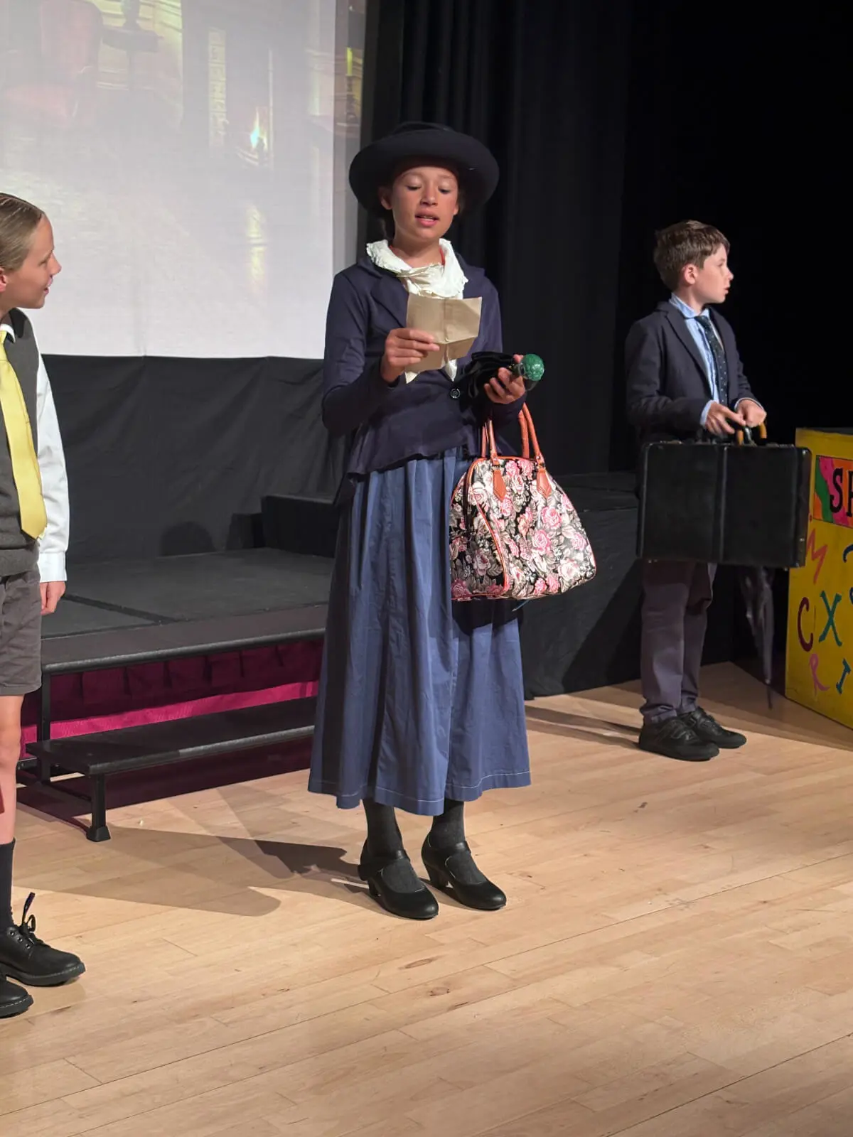 Pupils performing on stage in our Mary Poppins production at Brooke Priory School, a private school in Rutland