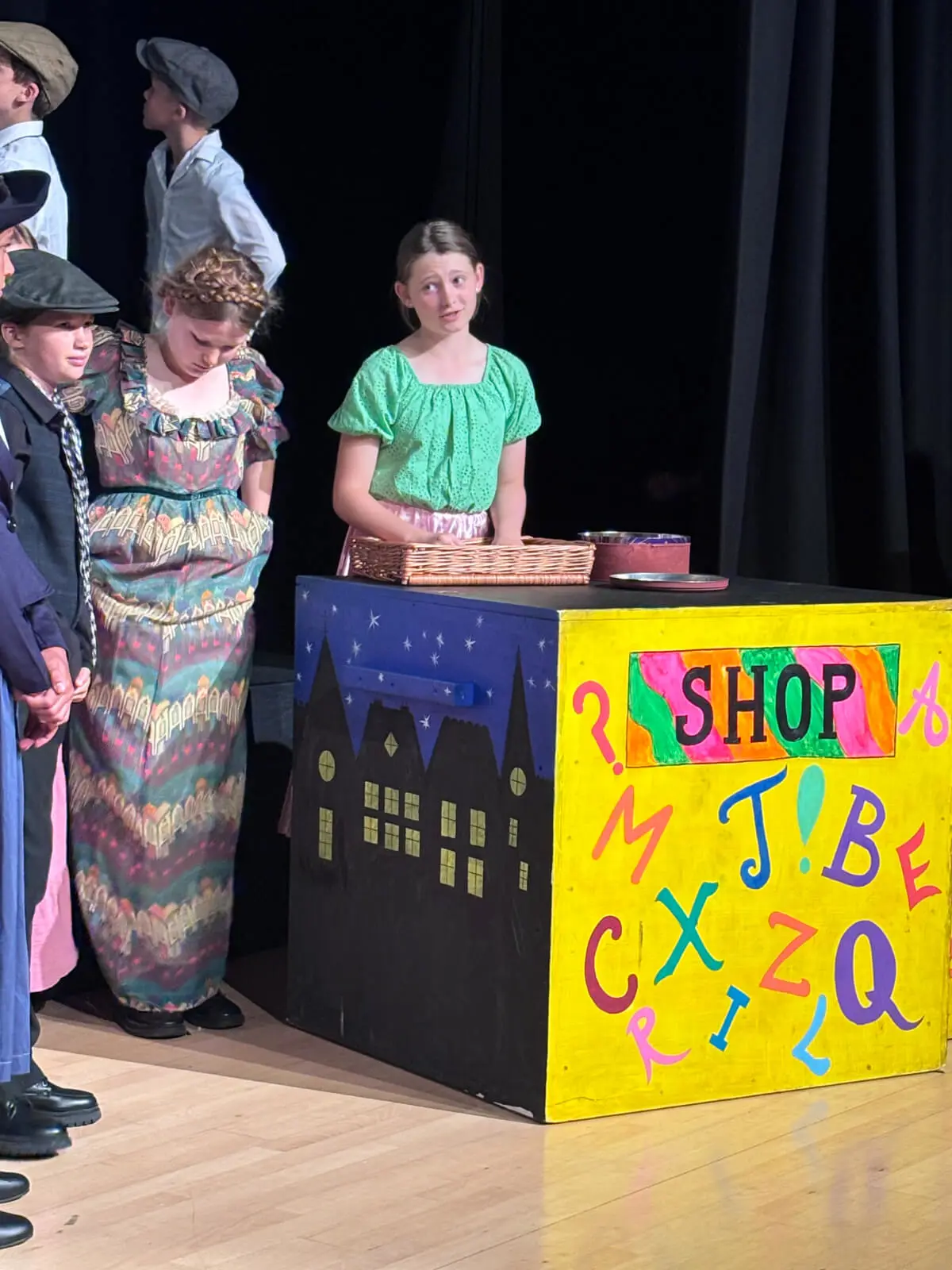 Pupils performing on stage in our Mary Poppins production at Brooke Priory School, a private school in Rutland