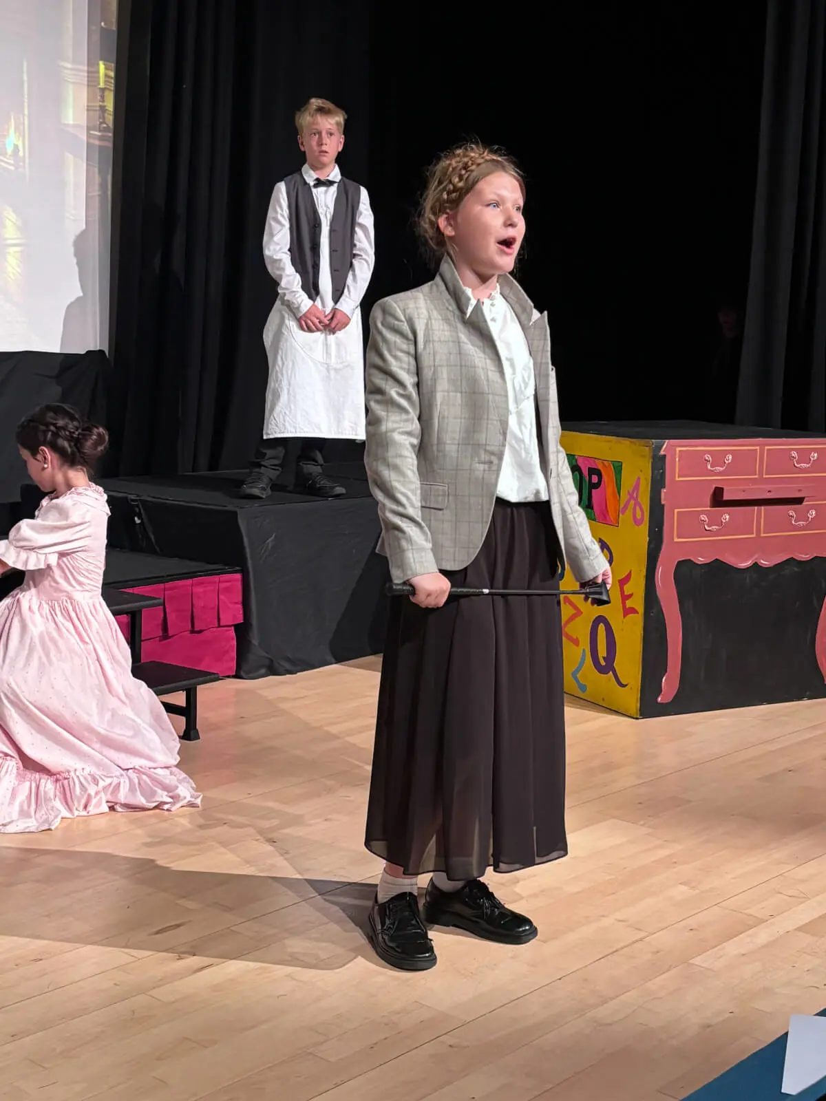 Pupils performing on stage in our Mary Poppins production at Brooke Priory School, a private school in Rutland