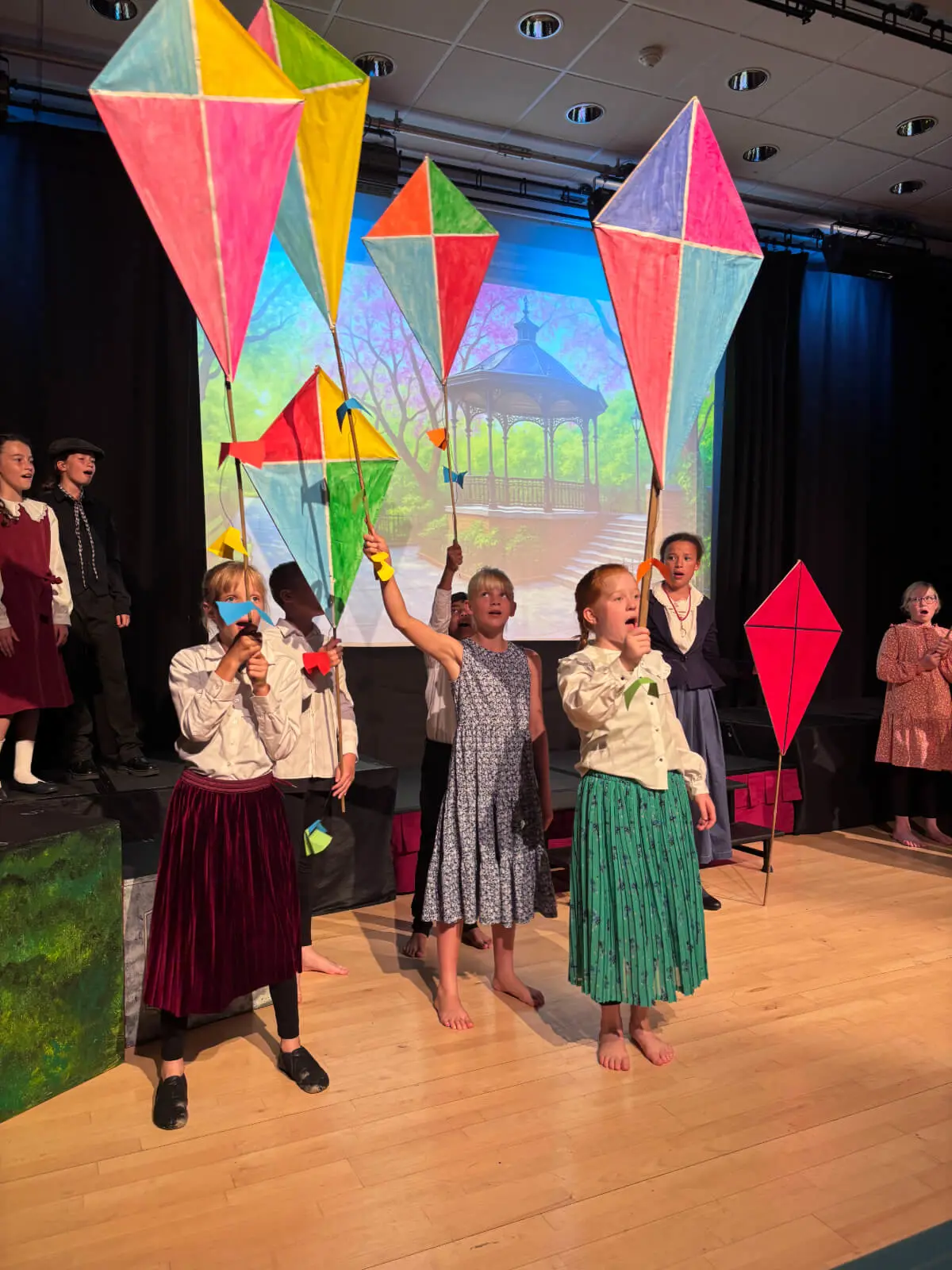 Pupils performing on stage in our Mary Poppins production at Brooke Priory School, a private school in Rutland