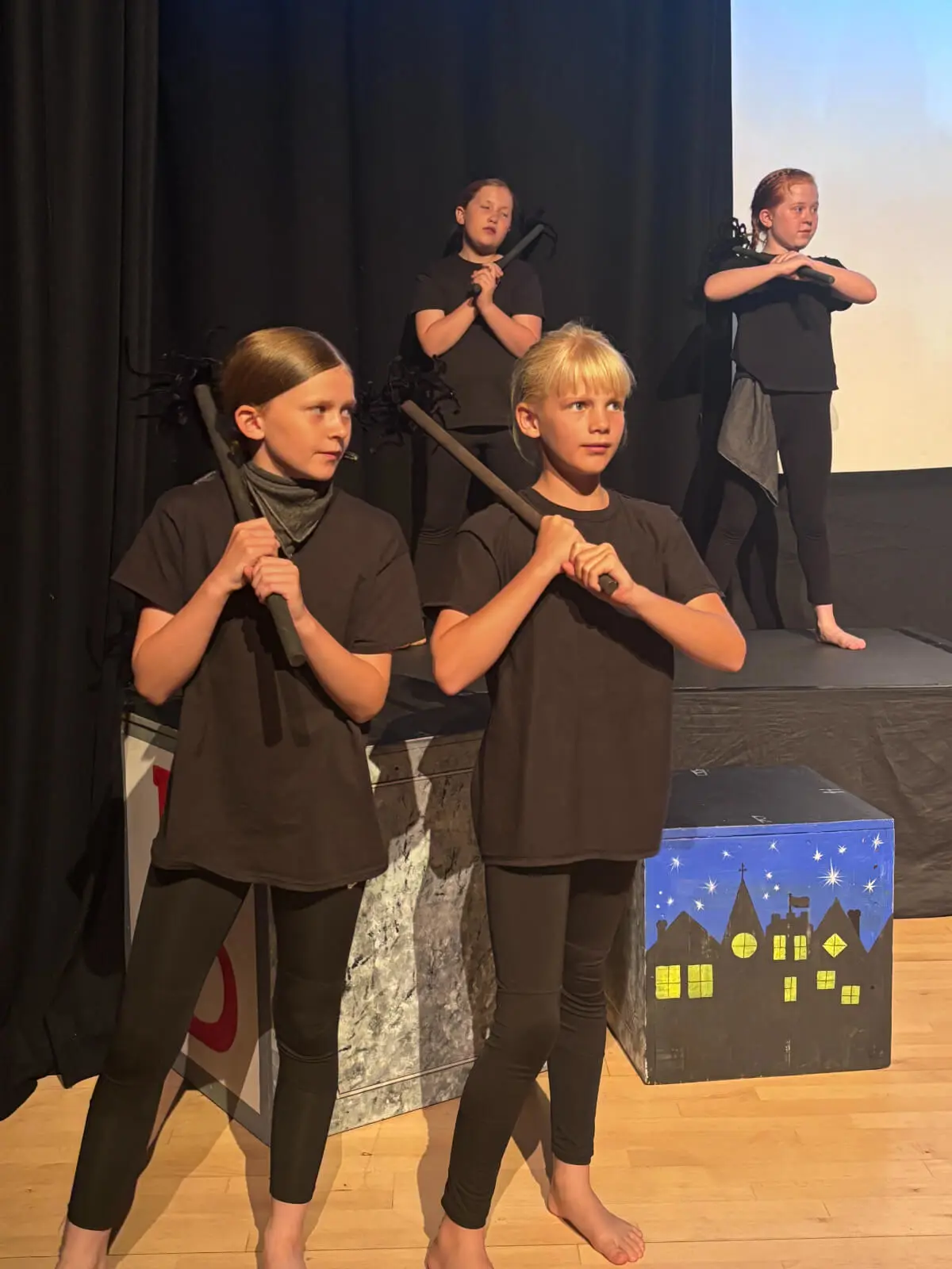 Pupils performing on stage in our Mary Poppins production at Brooke Priory School, a private school in Rutland